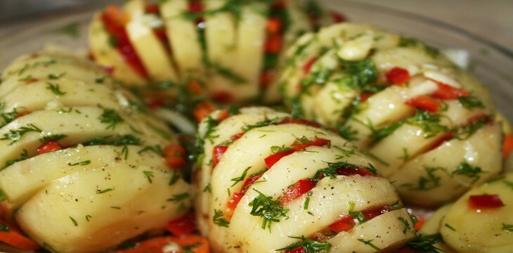Tasty baked potatoes with corn filling